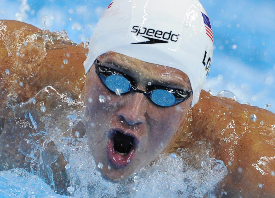 US swimmer Ryan Lochte  competes in the heats of the men's 200-metre individual medley swimming event in the FINA World Championships at the indoor stadium of the Oriental Sports Center in Shanghai on July 27, 2011.     AFP PHOTO / MARK RALSTON (Photo credit should read MARK RALSTON/AFP/Getty Images)