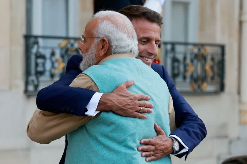 French President Emmanuel Macron welcomes Indian Prime Minister Narendra Modi, in Paris