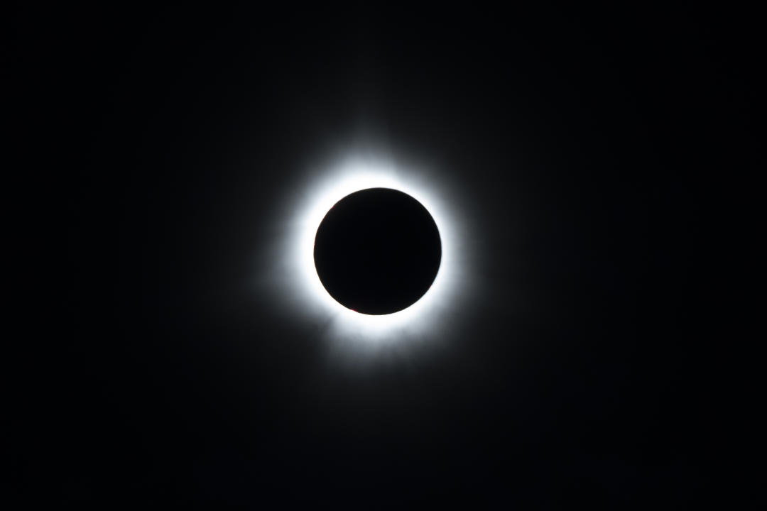 The moon covers the sun during totality of the a total solar eclipse in Fredericton, Monday, April 8, 2024. THE CANADIAN PRESS/Darren Calabrese