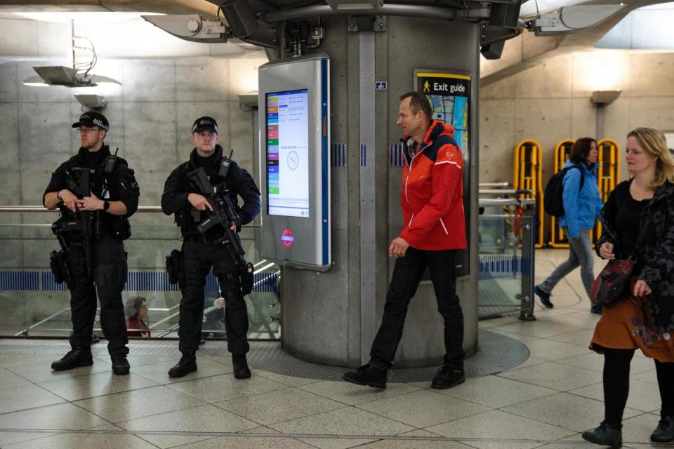 Armed police patrol in Westminster Underground station following the attack last week: Getty Images