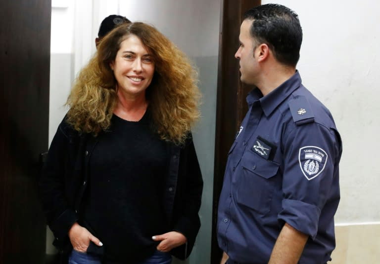 Stella Handler (L), CEO of the Israeli Bezeq telecommunication company, appears in the Israeli Justice Court in Tel Aviv on February 21, 2018