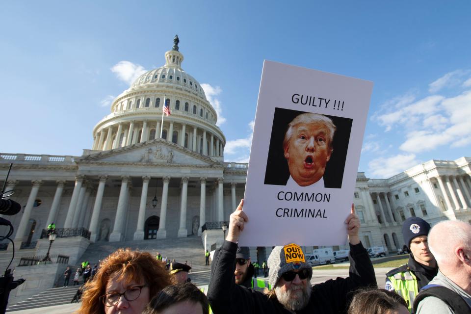 Demonstrators protest outside of the Capitol during the Senate impeachment trial on Jan. 29, 2020.
