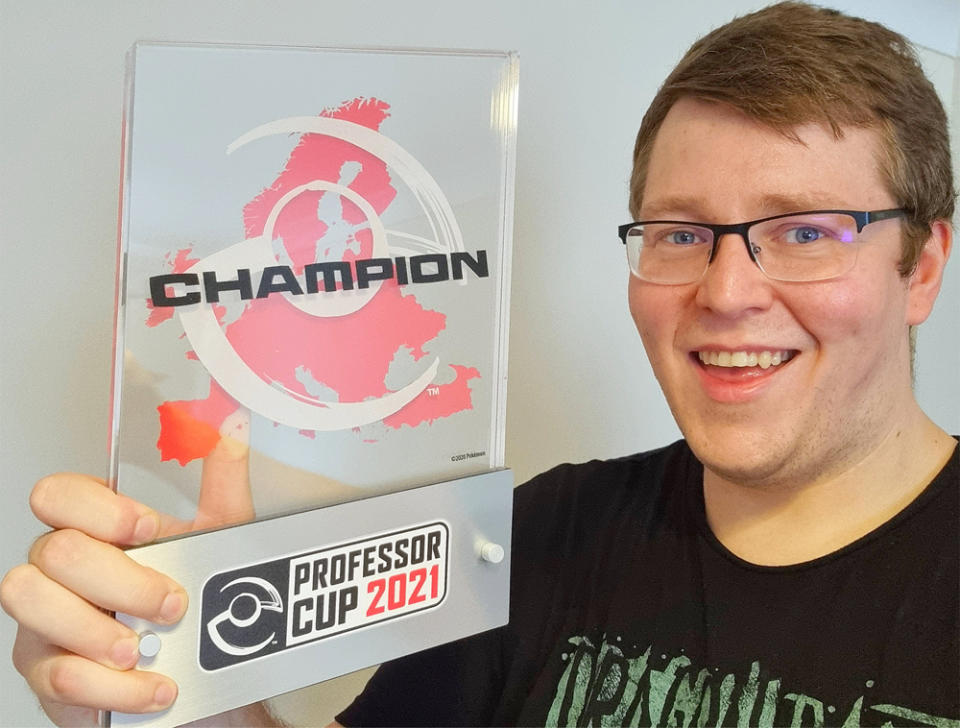 Stephen L. Kent, 32, with a trophy he won for winning the Professor Cup Winter 2021, an exclusive event only for Pokemon Professors (Collect/PA Real Life)