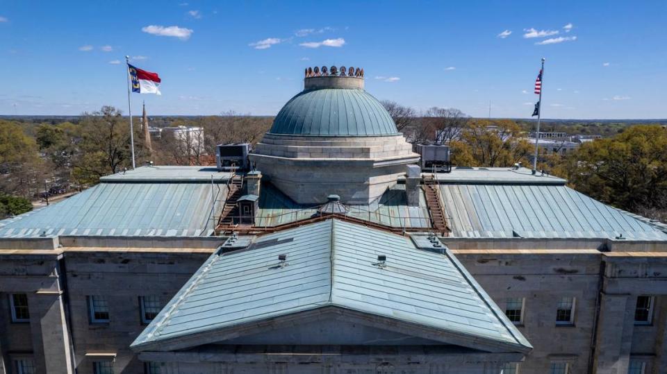 An aerial view of the NC State Capitol roof Tuesday, March 14, 2022. The roof, and dome, is being replaced in summer 2023 with new copper.