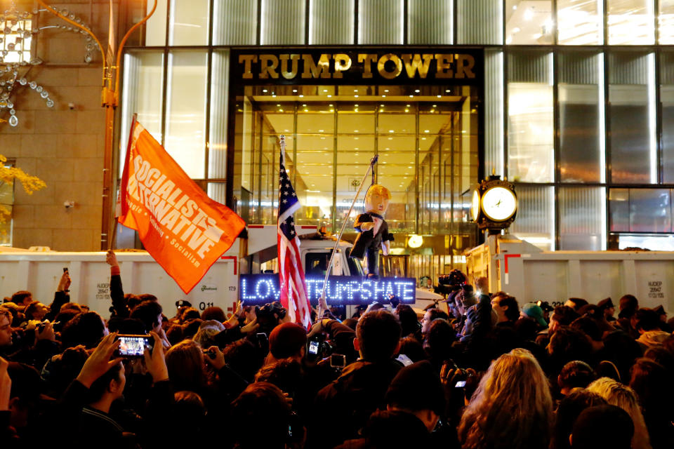 Protesters reach Trump Tower as they march against Republican president-elect Donald Trump in the neighborhood of Manhattan in New York, U.S., November 9, 2016.  REUTERS/Eduardo Munoz