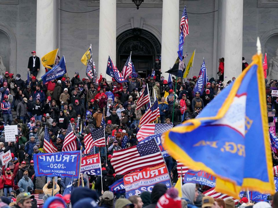 Supporters of Donald Trump protest outside the US Capitol in Washington, DC on 6 January (AFP via Getty Images)
