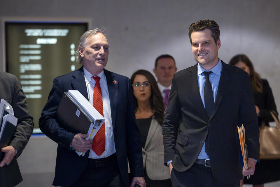 House Oversight and Accountability Committee member Rep. Andy Biggs, R-Ariz., left, and House Judiciary Committee member Rep. Matt Gaetz, R-Fla., right, leave the O'Neill House Office Building following a closed-door deposition with Hunter Biden, son of President Joe Biden, on Capitol Hill in Washington, Wednesday, Feb. 28, 2024. The Republican-led inquiry is looking at whether Joe Biden acted improperly while in office to benefit his family's financial deals. (AP Photo/J. Scott Applewhite)