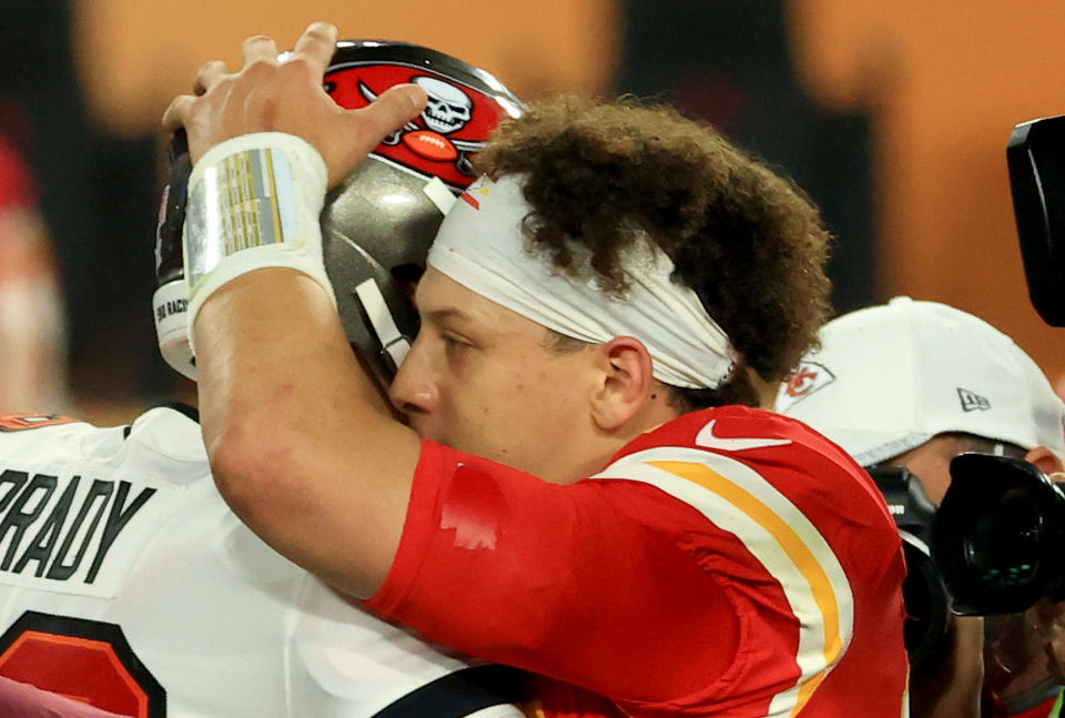 Tom Brady and Patrick Mahomes speak after Super Bowl LV when Brady's Buccaneers defeated Mahomes' Chiefs 31-9. (Photo by Mike Ehrmann/Getty Images)