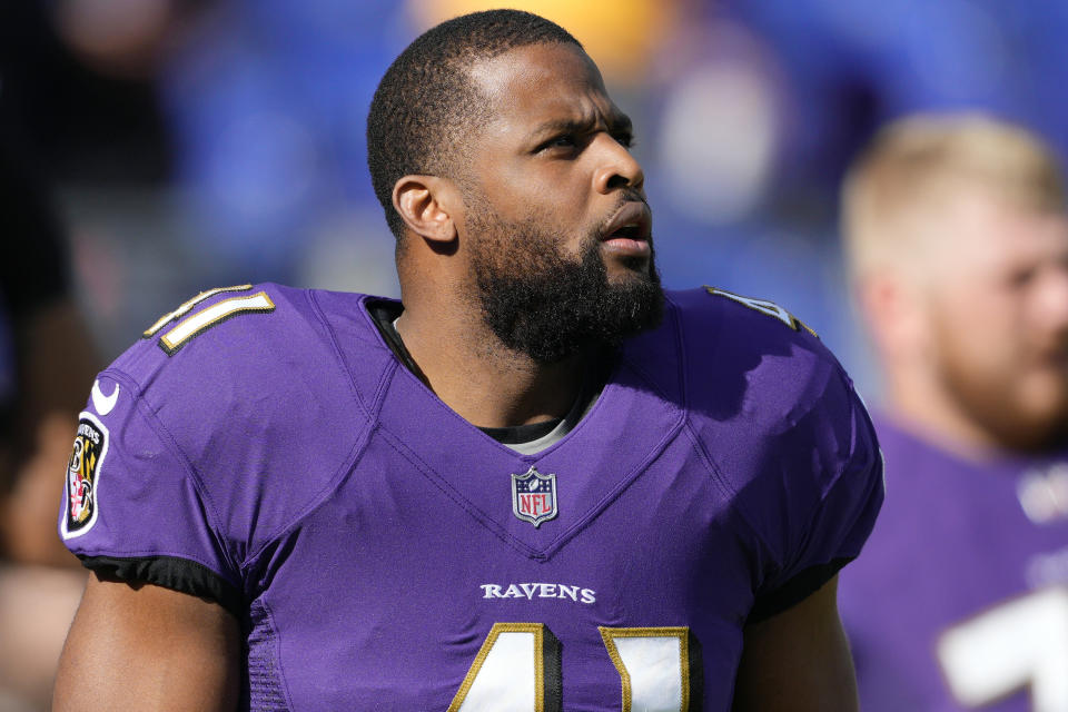 FILE - Baltimore Ravens safety Anthony Levine Sr. (41) warms up before an NFL football game against the Minnesota Vikings, on Nov. 7, 2021, in Baltimore. Levine announced his retirement Wednesday, Jan. 26, 2022, after a decade with the Ravens. (AP Photo/Nick Wass, File)