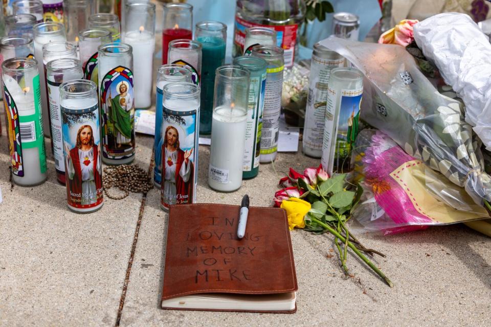 A memorial grows at the scene where three people died and three were severely injured following a high-speed crash.