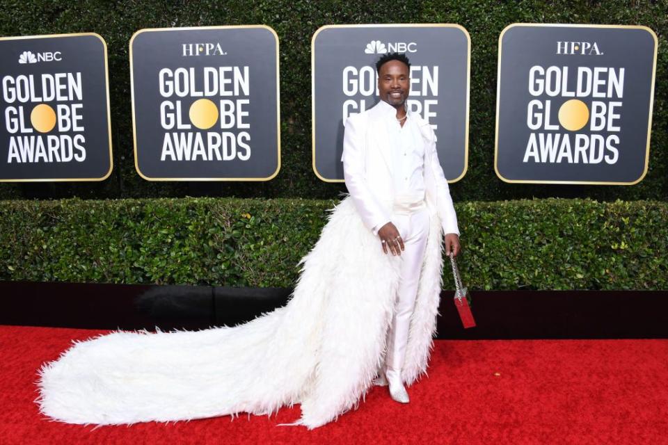 <p>Though technically not a gown, Billy Porter stole the red carpet in a white tuxedo with white feather angel wings designed by Alex Vinash.</p>