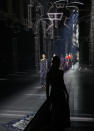 Models wear creations for the Fendi Spring-Summer 2022 Haute Couture fashion collection, in Paris, Thursday, Jan. 27, 2022. (AP Photo/Thibault Camus)