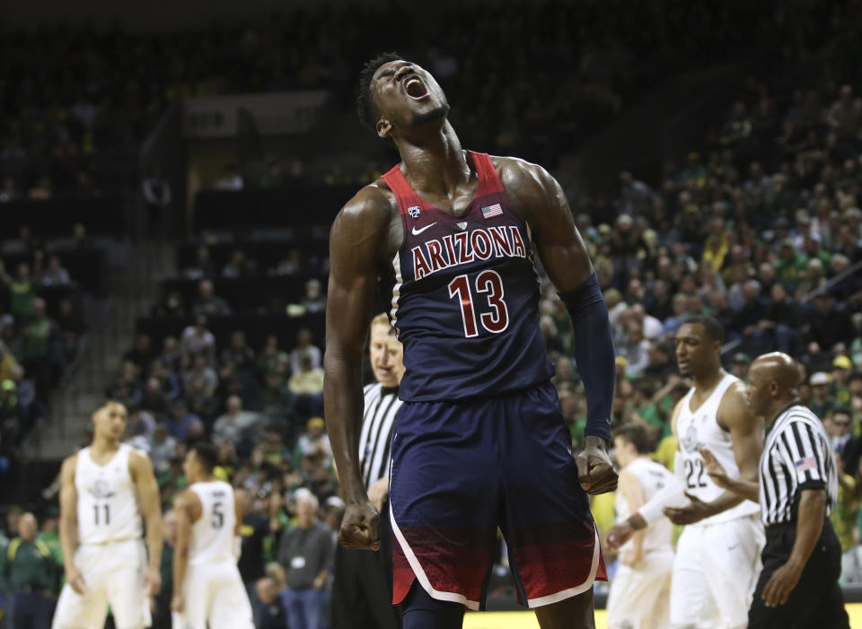 Arizona’s DeAndre Ayton celebrates during the second half against Oregon in an NCAA college basketball game Saturday, Feb. 24, 2018, in Eugene, Ore. Oregon won 98-93 in overtime. (AP Photo/Chris Pietsch)