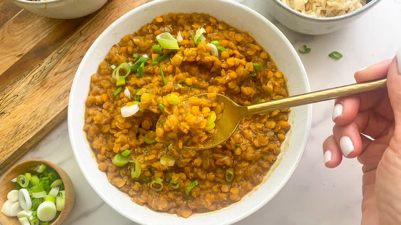 lentils and green onion in bowl