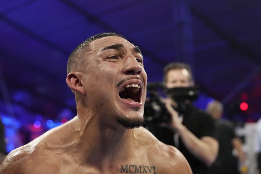 Teofimo Lopez celebrates after defeating Pedro Campa by TKO in a junior welterweight boxing match, Saturday, Aug. 13, 2022, in Las Vegas. (AP Photo/John Locher)