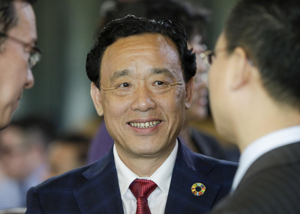 Qu Dongyu from China, one of the candidates for the Director-General position of the FAO (UN Food and Agriculture Organization), arrives to address a plenary meeting of the 41st Session of the Conference, at the FAO headquarters in Rome, Saturday, June 22, 2019. The new FAO Director-General will be voted on Sunday. (AP Photo/Andrew Medichini)