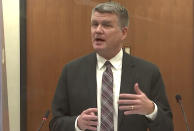 In this screen grab from video, Assistant Minnesota Attorney General Matthew Frank questions a potential juror as Hennepin County Judge Regina Chu presides over jury selection Wednesday, Dec. 1, 2021, in the trial of former Brooklyn Center police Officer Kim Potter in the April 11, 2021, death of Daunte Wright, at the Hennepin County Courthouse in Minneapolis, Minn. (Court TV via AP, Pool)