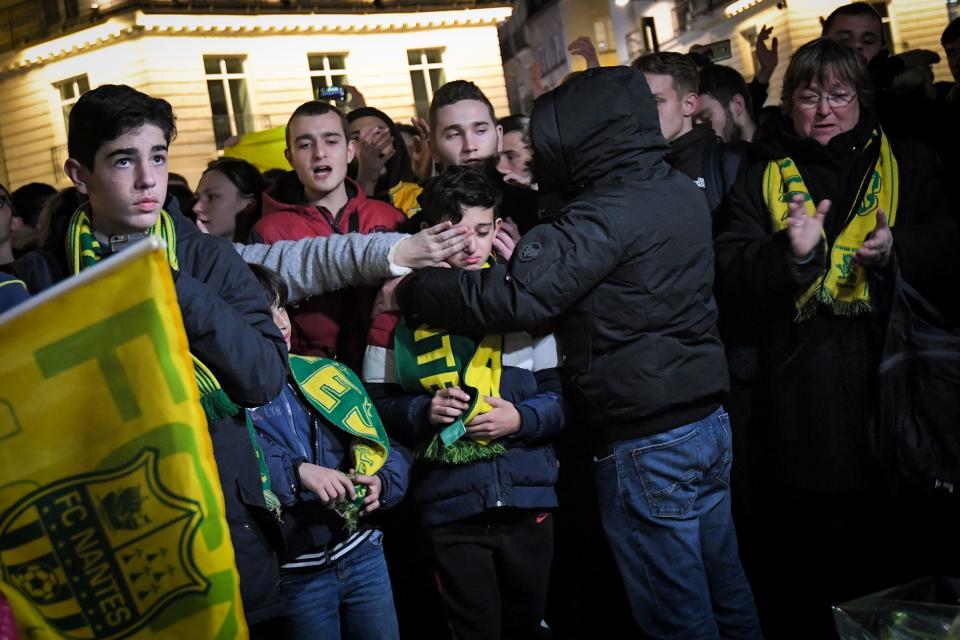 <p>Nantes fans come together to pay tribute to missing Cardiff striker Emiliano Sala (Getty Images) </p>