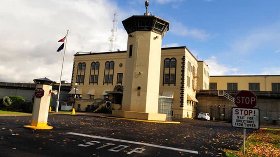 Melissa Ann Blair and Anthony Powell shared a long kiss at the end of a visit last year at the Oregon State Penitentiary. Source: AP