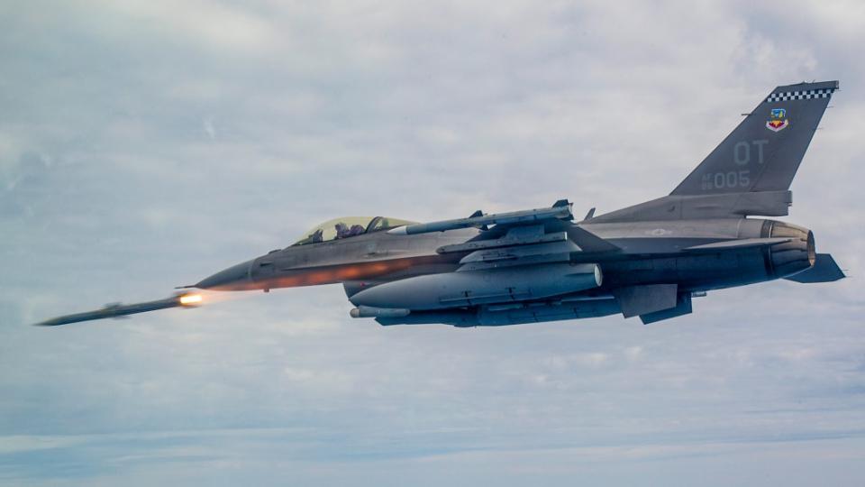 A 53rd Wing F-16C fires an AIM-120 AMRAAM during a Combat Archer exercise. <em>USAF</em>