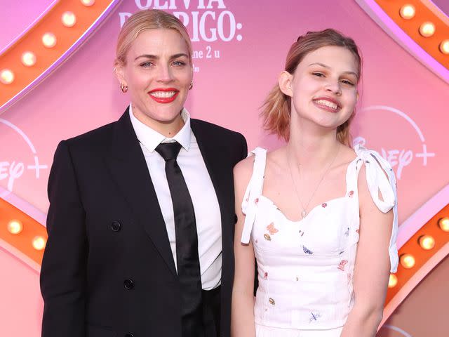 <p>Jesse Grant/Getty</p> Busy Philipps and Birdie Silverstein attend the "Olivia Rodrigo: driving home 2 u (a Sour film) Premiere"