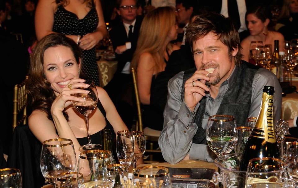 Actors Angelina Jolie (L) and Brad Pitt inside at the 13th ANNUAL CRITICS' CHOICE AWARDS at the Santa Monica Civic Auditorium on January 7, 2008 in Santa Monica, California