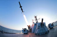 <p>A missile is fired from a naval vessel during the test-firing of a new type of anti-ship cruise missile to be equipped at Korean People’s Army (KPA) naval units in this undated photo. (KCNA/Reuters) </p>