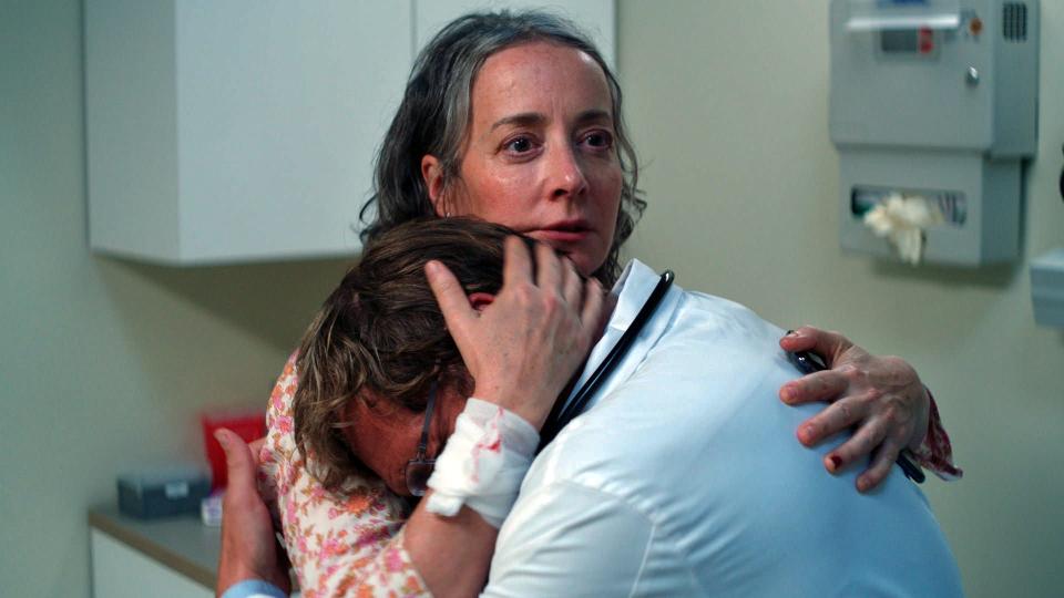 Jane (Jane Adams) comforts Doc (Josh Lucas) after spreading doom his way in "She Dies Tomorrow."