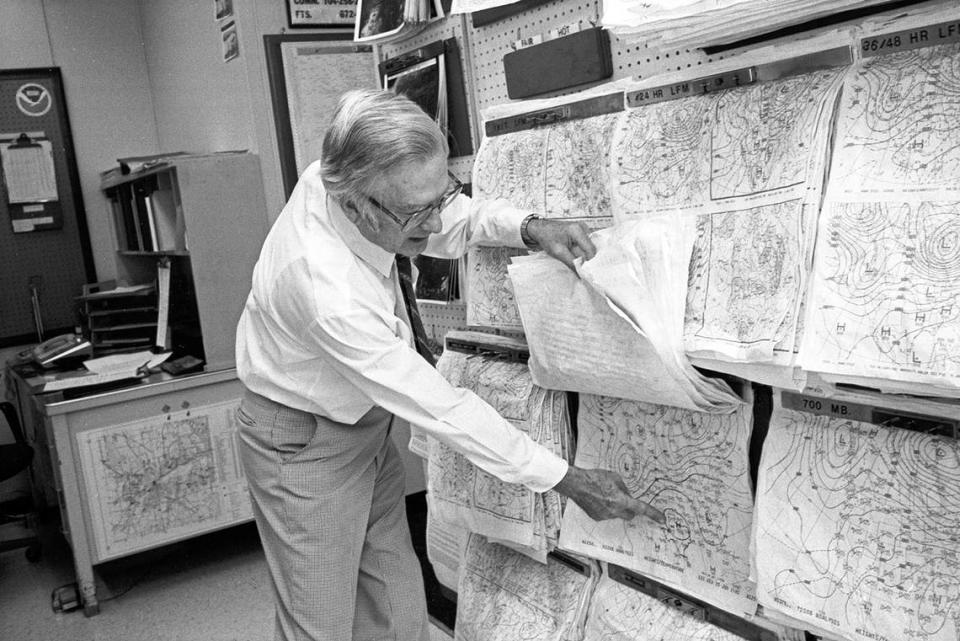 July 3, 1980: Harold McCrabb, meteorologist in charge at the National Weather Service’s Fort Worth office, reviews meteorological charts during a heat wave in Fort Worth. McCrabb attributes the heat to a high pressure system settled over Texas and the Southwest. Dale Blackwell/Fort Worth Star-Telegram archive/UT Arlington Special Collections