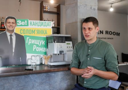 Roman Hryshchuk speaks during an interview with Reuters at his election headquarter in Kiev