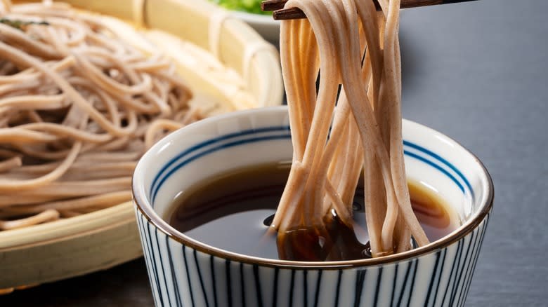 Dipping soba in tsuyu