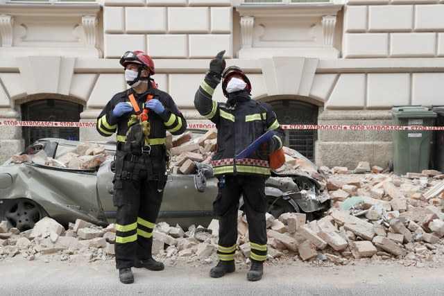 Firemen inspect damage in Zagreb