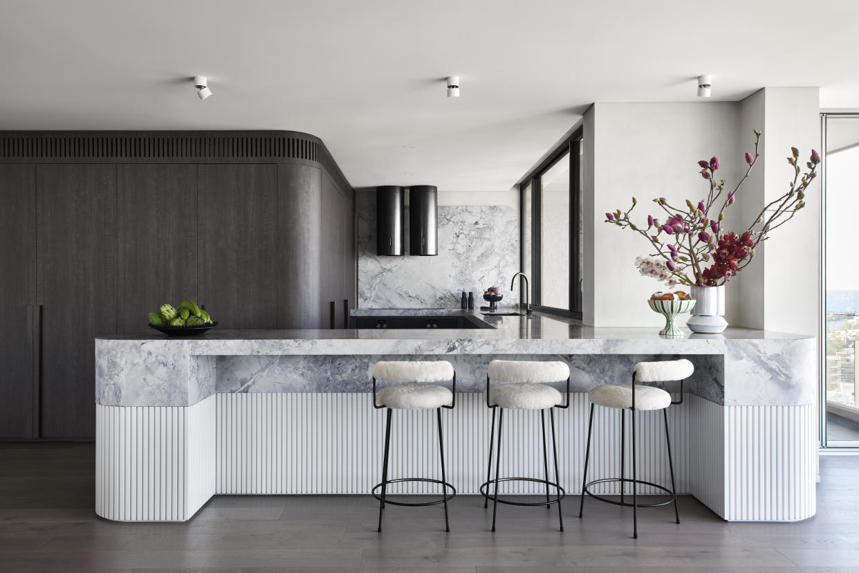  A kitchen with fluted island. 