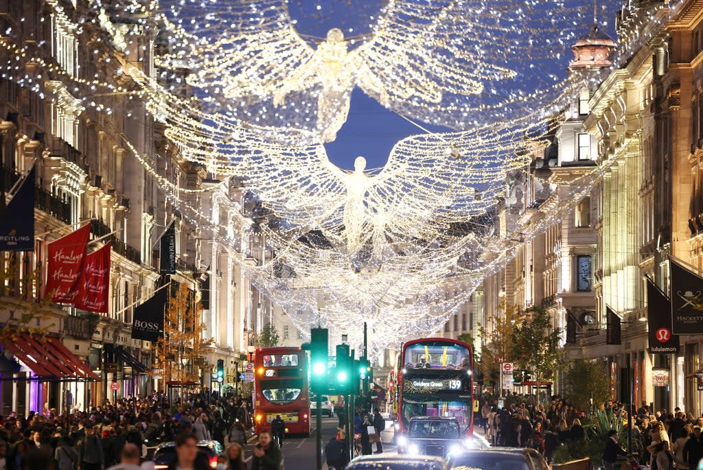 People walk along Regent Street (REUTERS)