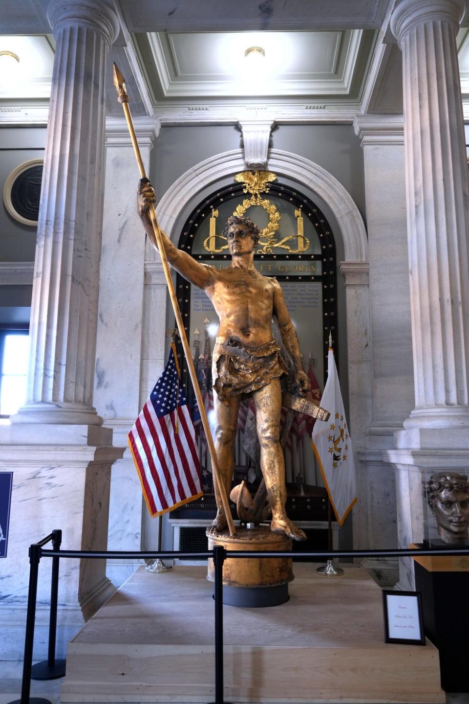 The Independent Man on display inside the Rhode Island State House in December. The iconic golden figure was taken down from atop the State House for restoration.