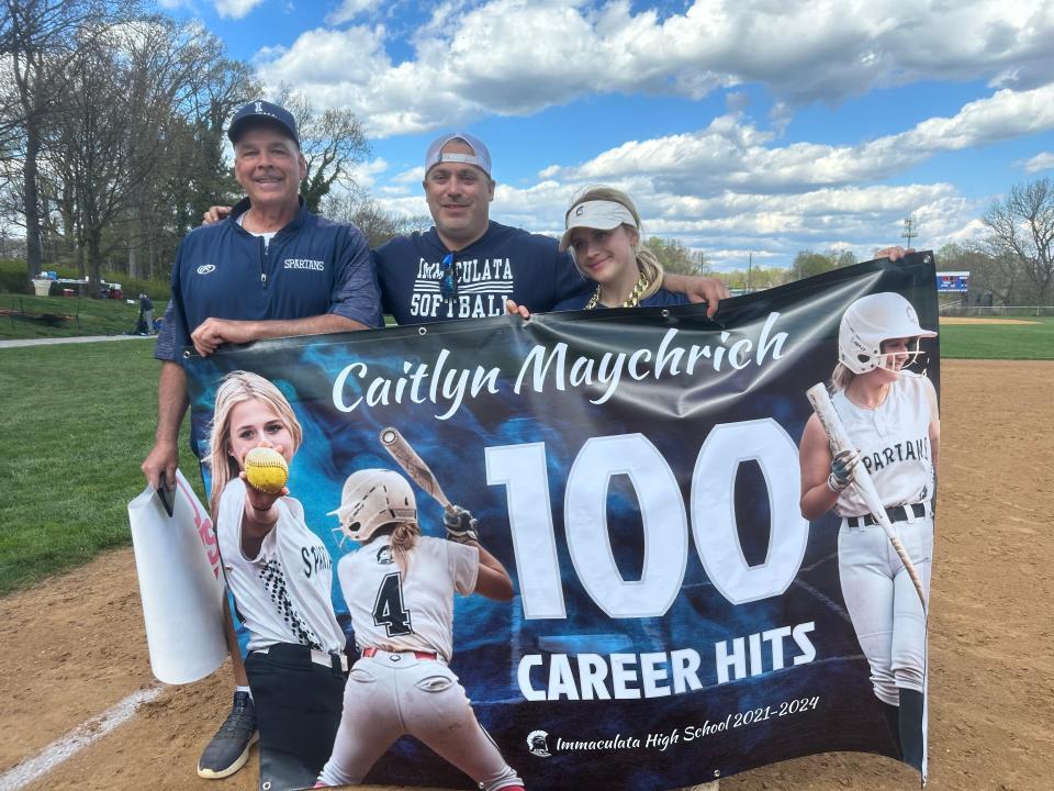 Immaculata's Caitlin Maychrich celebrates her 100th career hit last Saturday