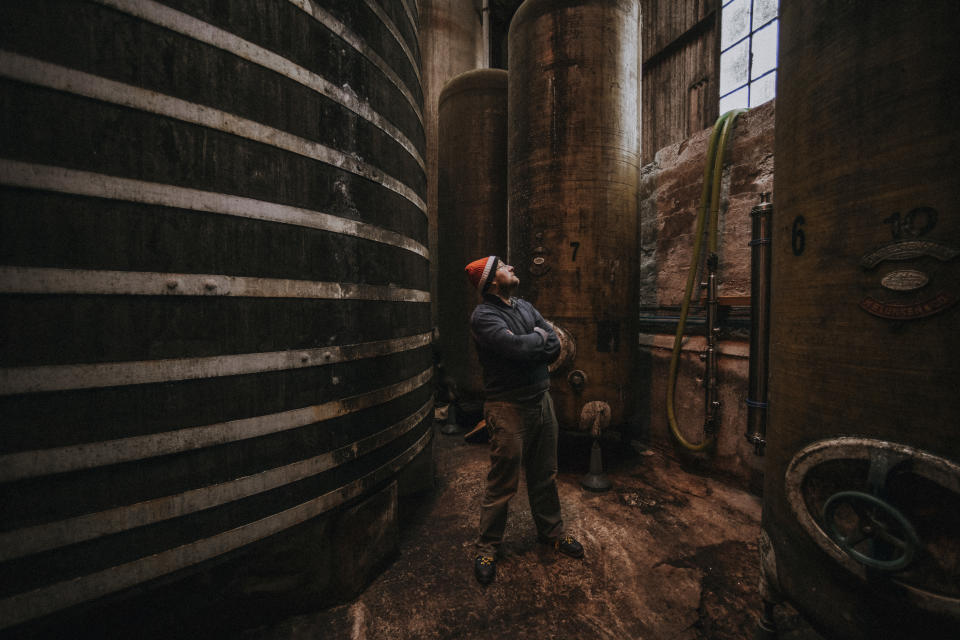 Barny Butterfield in the Cider Works mill which produces over two million gallons every year. Photo: Matt Austin