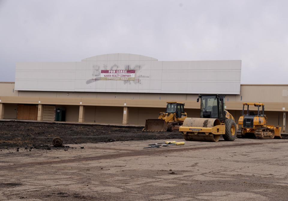 Construction work has started on the parking lot at the former Kmart site along Lincoln Way E in Massillon. The old retail building is to be remodeled to accommodate a new indoor/outdoor storage center.