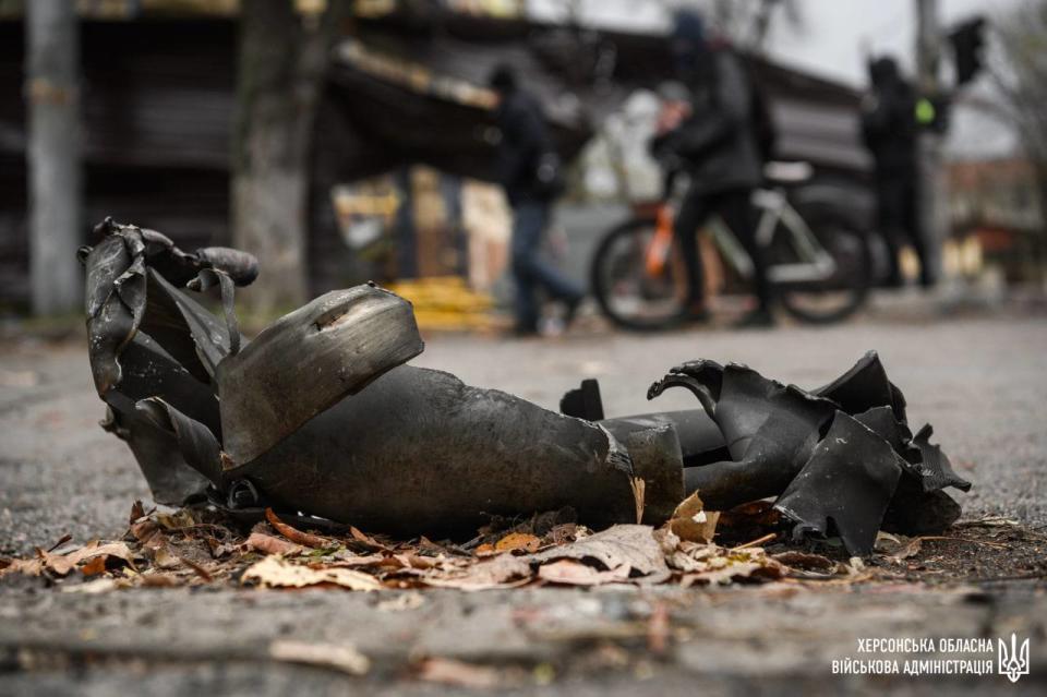 Another image showed a shell casing in the road (Kherson governor)