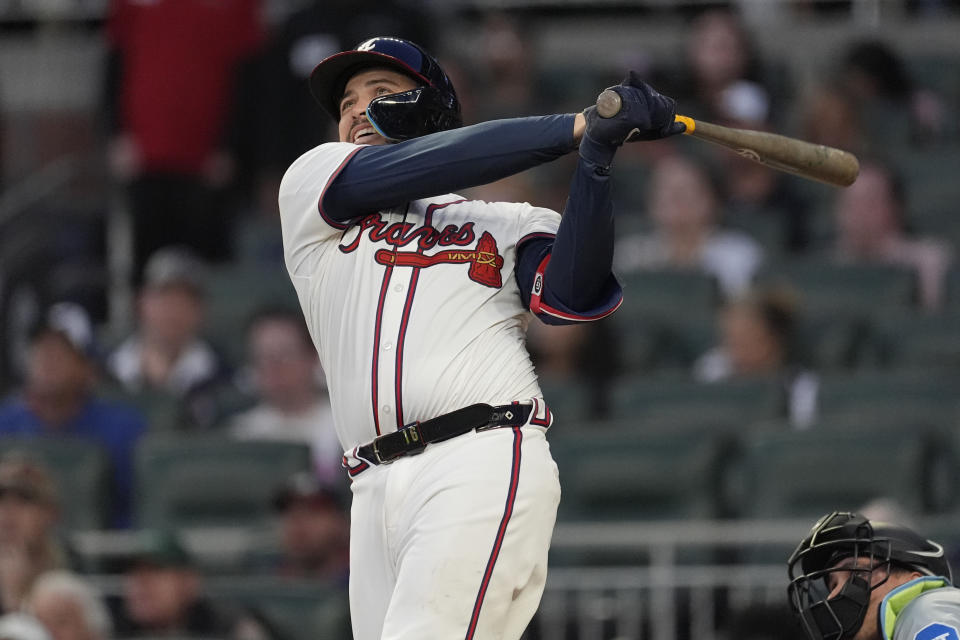 Atlanta Braves' Travis d'Arnaud watches a two-run home run in the fourth inning of a baseball game against the Miami Marlins Monday, April 22, 2024, in Atlanta. (AP Photo/John Bazemore)