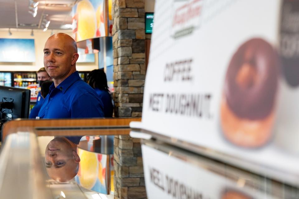 U.S. Rep. Brian Mast works behind the counter during a National Association of Convenience Stores in-store event on Wednesday, May 4, 2022, at a RaceTrac in Port St. Lucie. "It's always good to know what's going on with various businesses and how the business operates, because everything going on at the federal level, it effects how they do business," said Mast. The congressman received store associate training, worked behind the counter and spoke with employees and customers about issues important to the community.