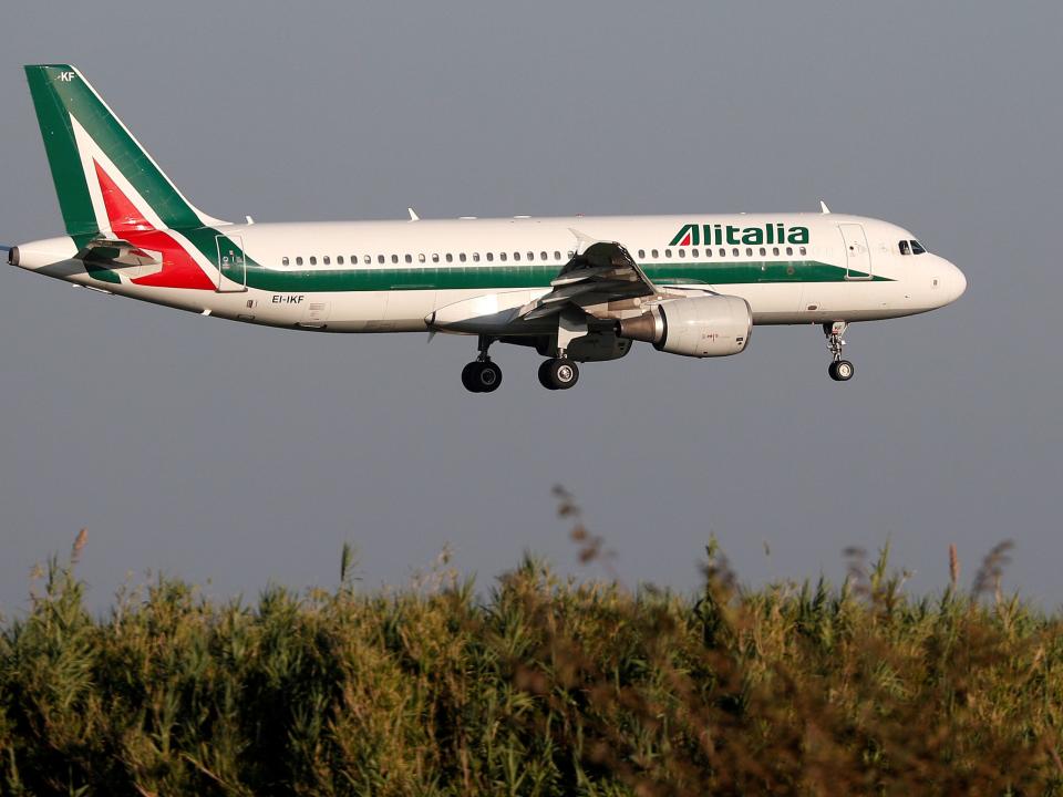FILE PHOTO: An Alitalia Airbus A320-200 airplane comes in to land at Fiumicino airport in Rome, Italy October 24, 2018. REUTERS/Max Rossi/File Photo