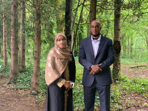 Shahra-sad Mohamed Warsame Ali and her husband Ali Hassan Hersi are suing Habitat for Humanity because they say they don't have an official mortgage on their home after six years of payments. (Yvette Brend/CBC News - image credit)