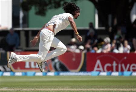 Ishant Sharma bowls to New Zealand's Brendon McCullum (not seen) during the second innings on day three of the second international test cricket match at the Basin Reserve in Wellington, February 16, 2014. REUTERS/Anthony Phelps