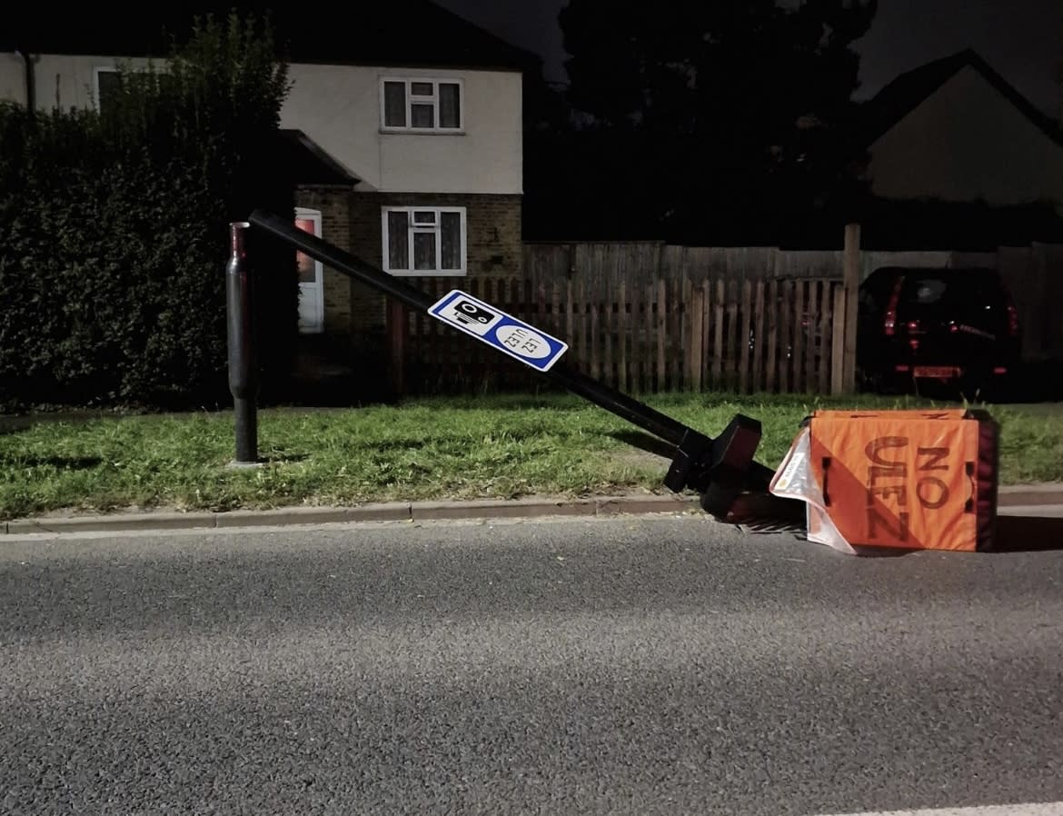 A damaged ultra-low emission zone (Ulez) camera lying on the road in Harefield, Uxbridge, Greater London. (AJ Simpson/PA)