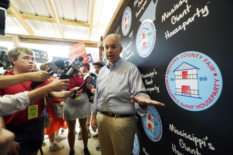 Democrat Brandon Presley, a candidate for governor in November, speaks to reporters following him speaking to the crowd at the Neshoba County Fair in Philadelphia, Miss., Thursday, July 27, 2023. Presley is currently one of three public service commissioners. (AP Photo/Rogelio V. Solis)