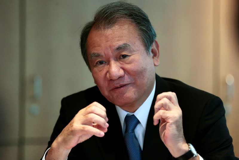 FILE PHOTO: Nikkei Chairman Tsuneo Kita speaks during an interview with Reuters at the Financial Times headquarters in London