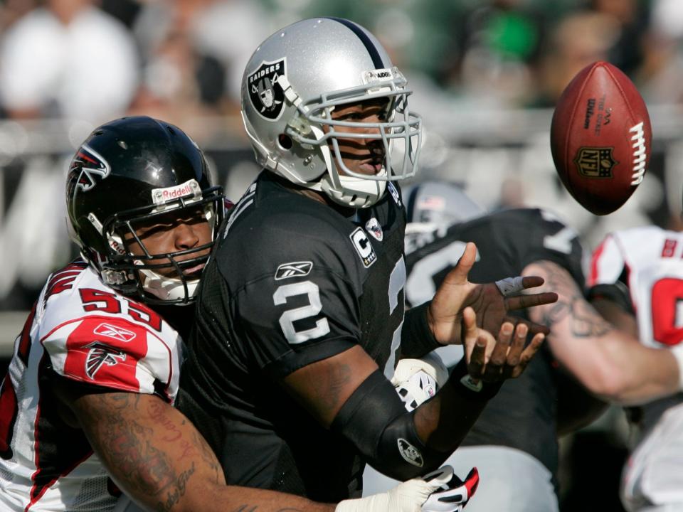 JaMarcus Russell fumbles the ball against the Atlanta Falcons.