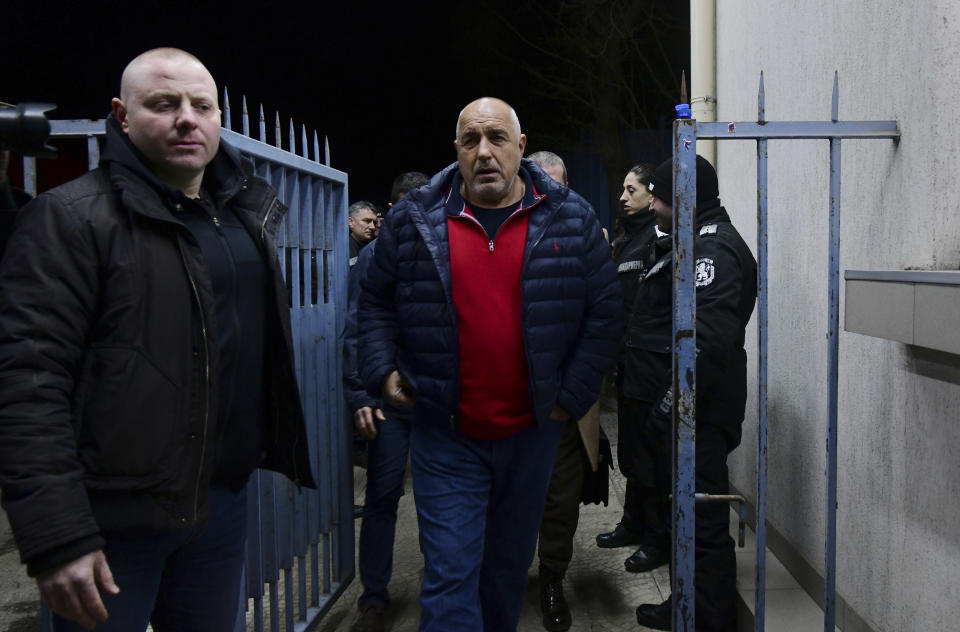 Former PM Boyko Borissov walks out of the police department where he was detained for 24 hours, in Sofia, Bulgaria, Friday, March 18, 2022. Bulgarian ex-Prime Minister Borissov was released from custody on Friday after prosecutors failed to come up with enough evidence to press charges against him. (Milena Stoykova/Bulfoto via AP)