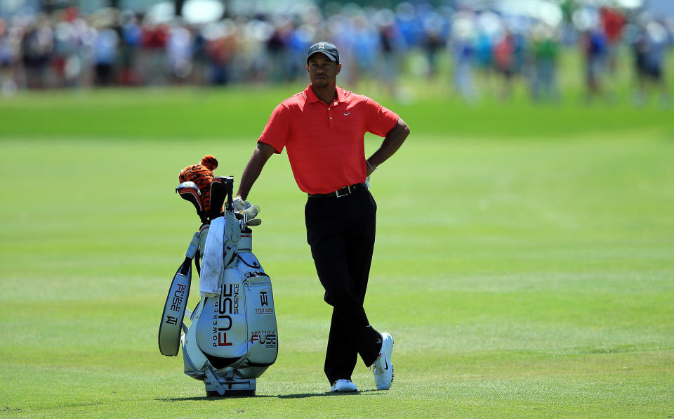 Tiger Woods of the USA waits to play his second shot at the par 4, first hole during the final round of the 2012 Arnold Palmer Invitational presented by MasterCard at Bay Hill Club and Lodge in Orlando, Florida. Woods won the Arnold Palmer Invitational at the Bay Hill golf course Sunday with a five shot victory over Graeme McDowell. (AFP Photo/David Cannon)